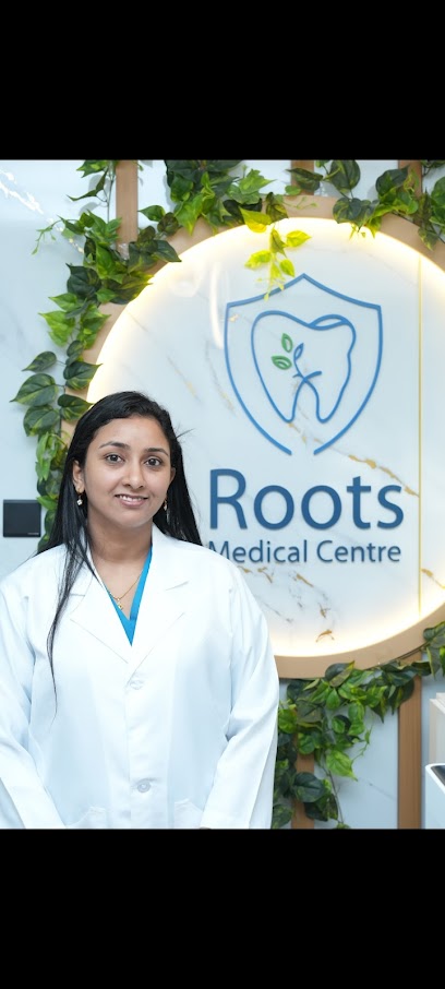 Dr Sruthi MS (MDS, ENDODONTIST) | ROOTS MEDICAL CENTRE | The Best GP Dentist | RCT | طبيب أسنان main image